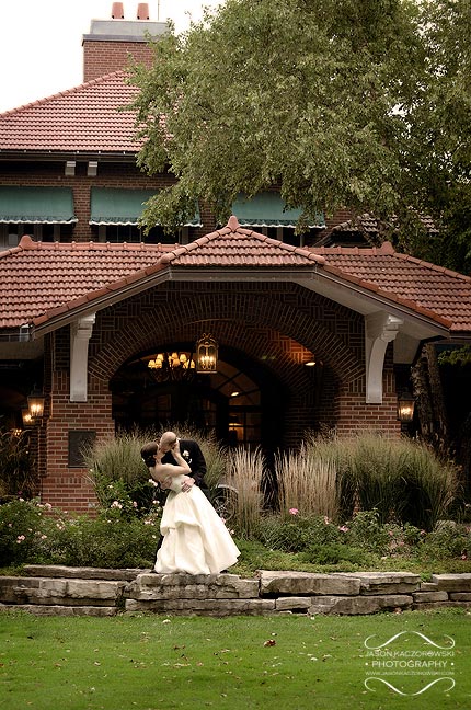 Bride and groom in front of Oak Park Country Club in River Grove Illinois