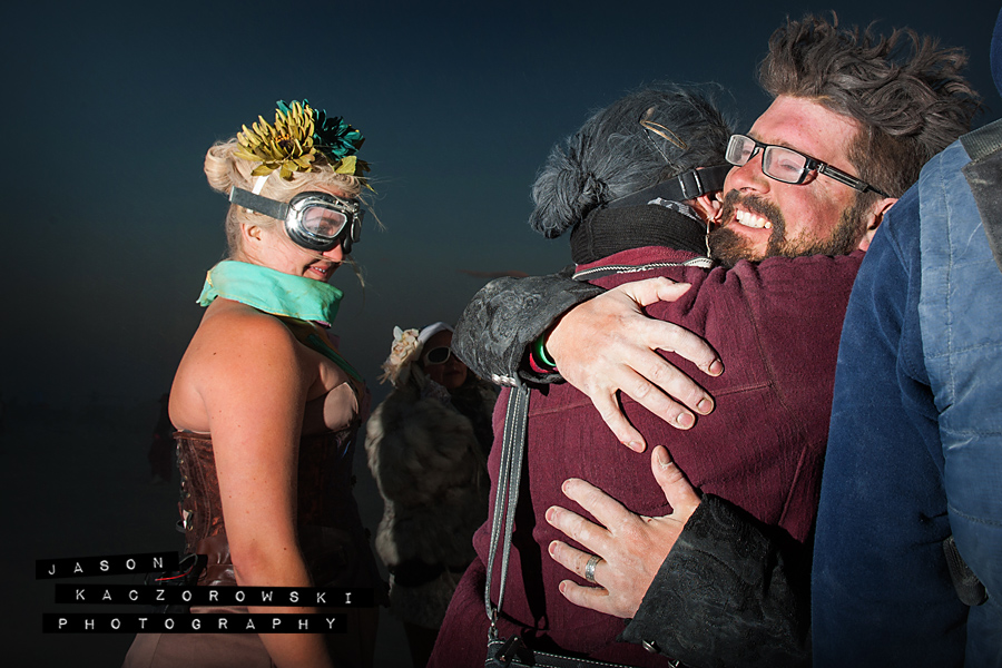 Groom Hugs Groomsman Burning Man 2015