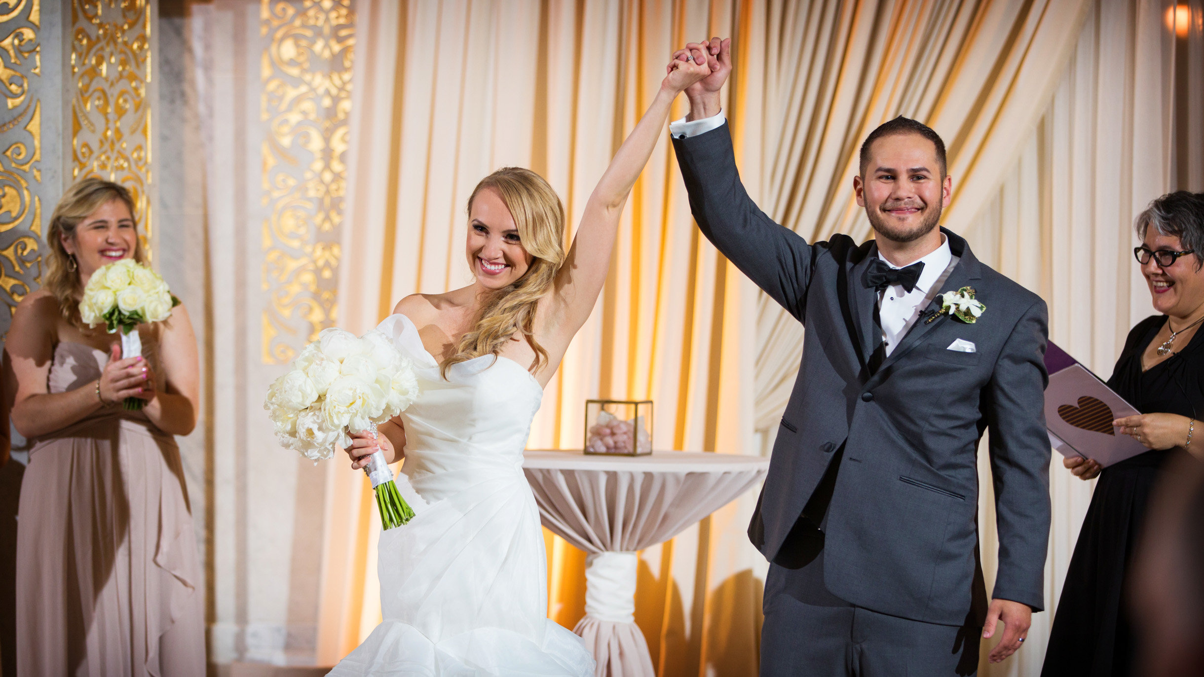 Bride and Groom celebrating after their wedding ceremony at the Rookery in Chicago-289