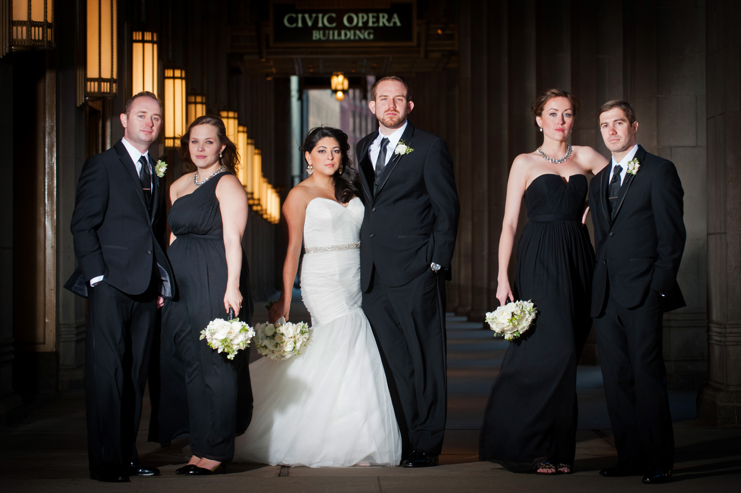 Dramatic wedding party photo at the Lyric Opera in Chicago