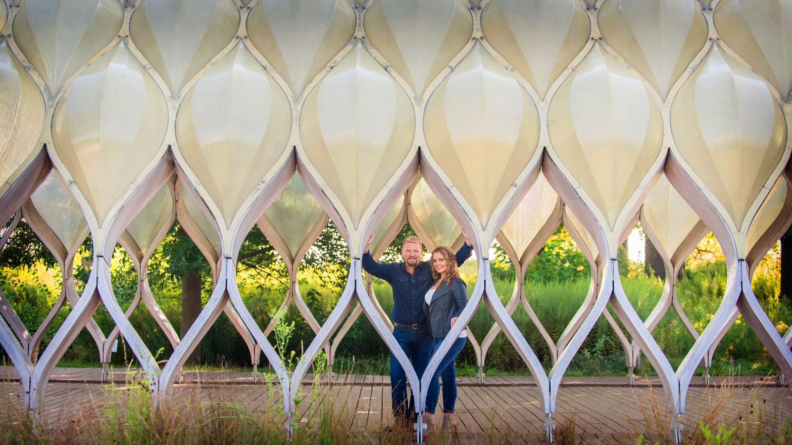 Chicago engagement session in Lincoln Park Zoo's South Pond inside the honeycomb structure called the People’s Gas Education Pavilion