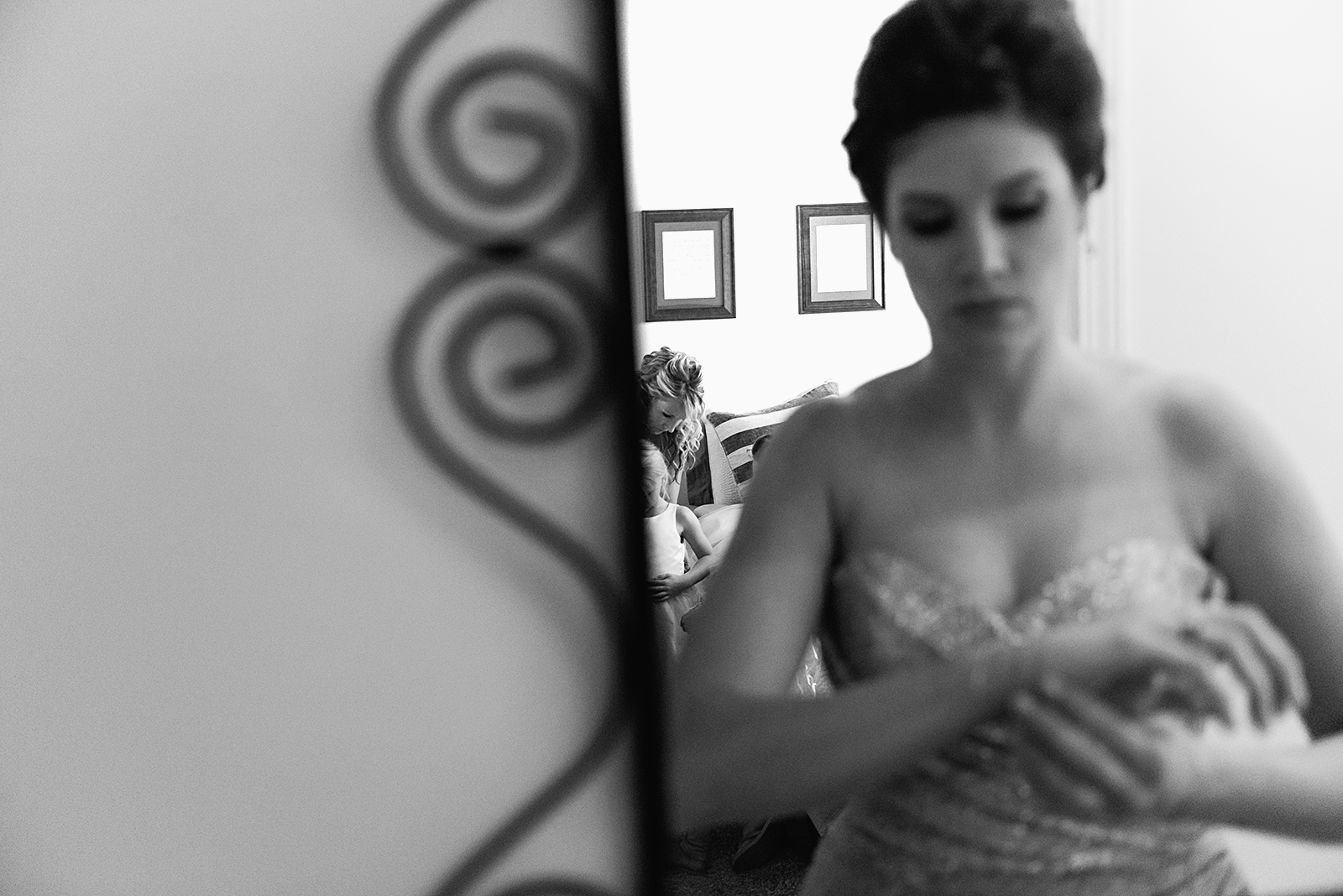 Bridesmaid getting ready in mirror