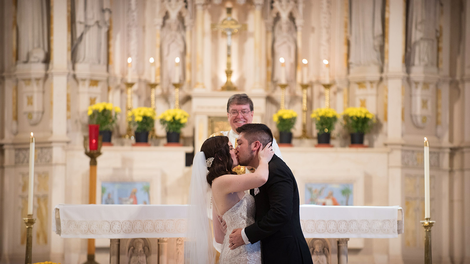 First Kiss after Wedding Ceremony at St Alphonsus Church in Chicago