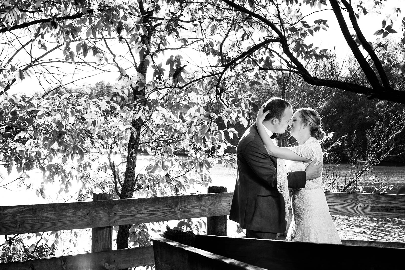 Black White Photo Bride Groom Kiss Bridge Eagle Ridge